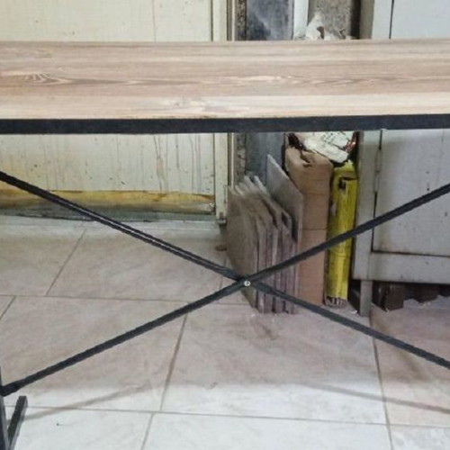 Metal table with MDF surface.