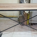 Metal table with MDF surface.