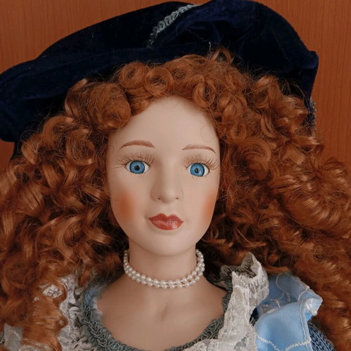 Vintage porcelain doll with velvet dress, large 80 cm