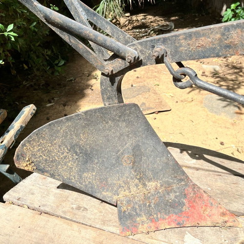 Antique plow used for outdoor decoration