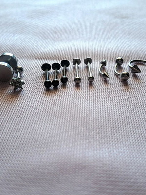 Steel piercing earrings set of 13 like new, black and silver