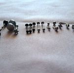 Steel piercing earrings set of 13 like new, black and silver