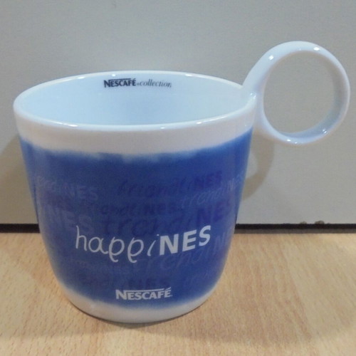 Nescafe Happines promotional porcelain mug used