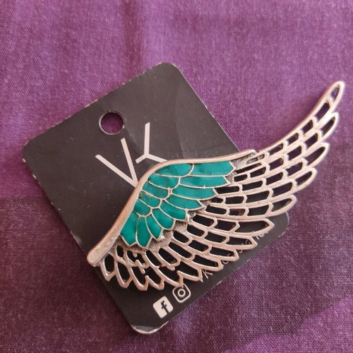 Feather brooch new with turquoise enamel and silver details