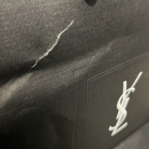 Yves Saint Laurent bag used with small tear