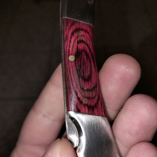 Vintage folding knife with extra safety button, like new