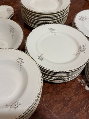 Minoan ceramic plates set of 57 like new