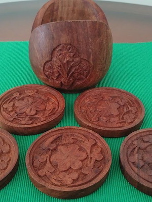 Handmade wooden coasters like new, set of six with carved floral designs