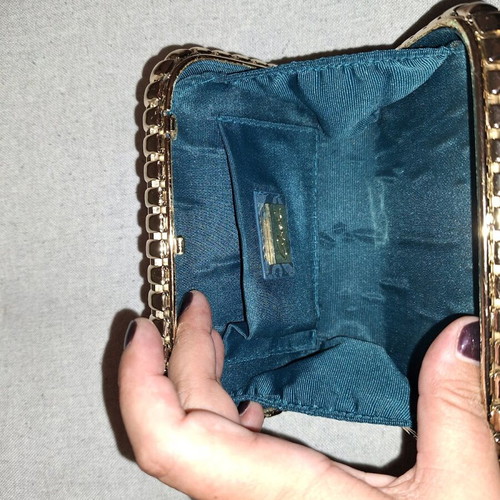 Axel small crossbody bag like new with detachable chain and embossed design
