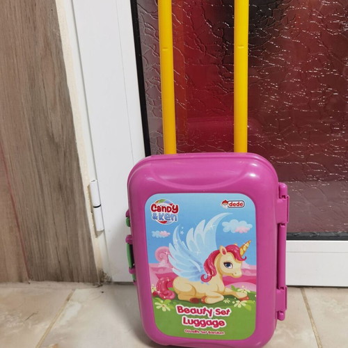 Children's plastic toy suitcase with wheels and unicorn picture used