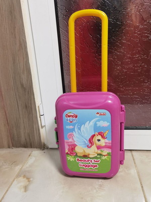 Children's plastic toy suitcase with wheels and unicorn picture used