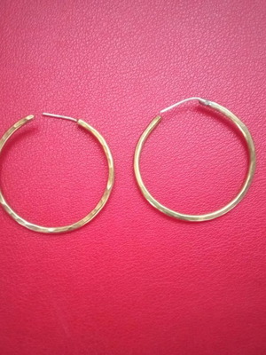 Hammered hoop earrings like new, gold color