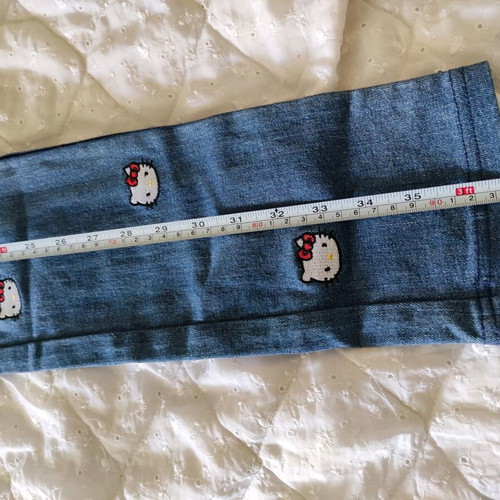 Hello Kitty denim jeans used, Y2K aesthetic, blue