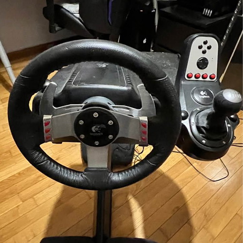 Playseat WRC sim racing seat with Logitech G27 wheel and H-shifter