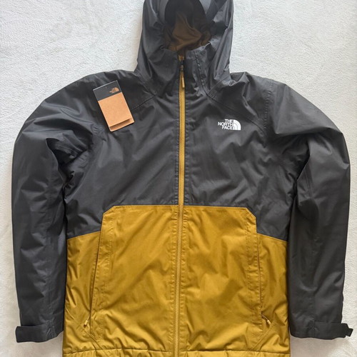 The North Face Millerton jacket like new, windproof, waterproof, black and gold