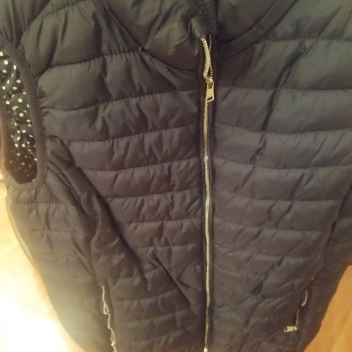 Sleeveless women's vest blue with light padding and polka dot lining, like new
