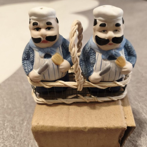 Vintage salt and pepper set with chef figures in wicker basket