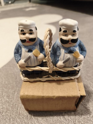 Vintage salt and pepper set with chef figures in wicker basket