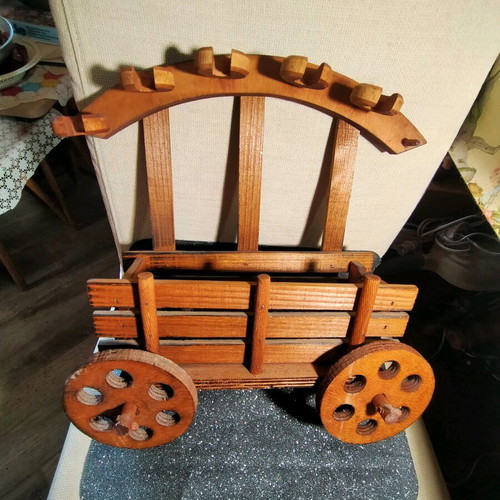 Decorative wooden object used for bottle and glass