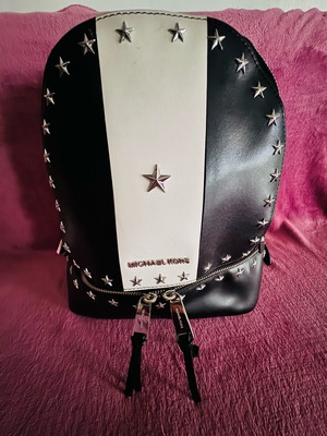 Michael Kors Rhea leather backpack like new, black and white
