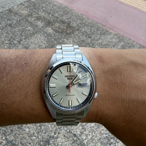Seiko 5 Sports SNXS Series Automatic watch with silver stainless steel bracelet