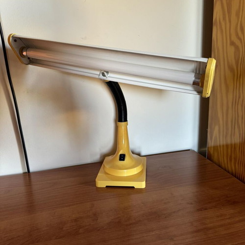 Yellow vintage desk lamp with flexible neck