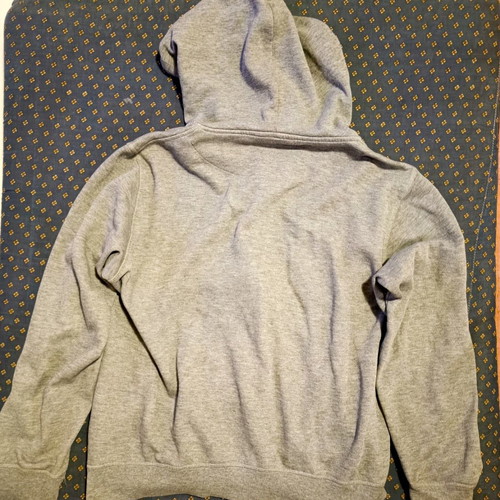 Gray jacket with hood, drawstring and zipper used