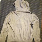 Gray jacket with hood, drawstring and zipper used