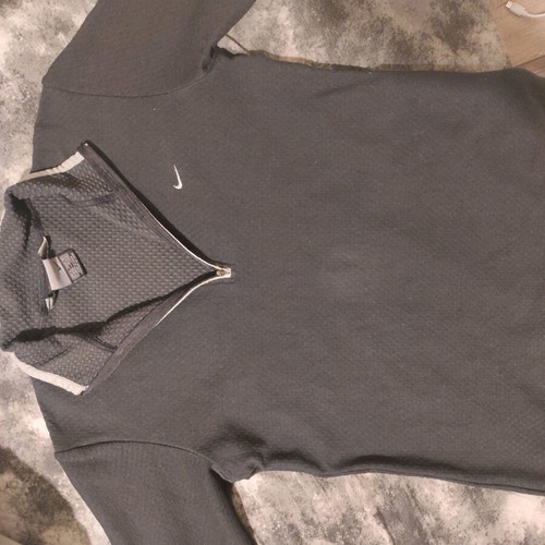 Nike women's shirt used, size M, black with left sleeve damage