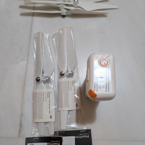 DJI Phantom 3 Advanced drone used with RC, new battery, hardshell case, and propellers