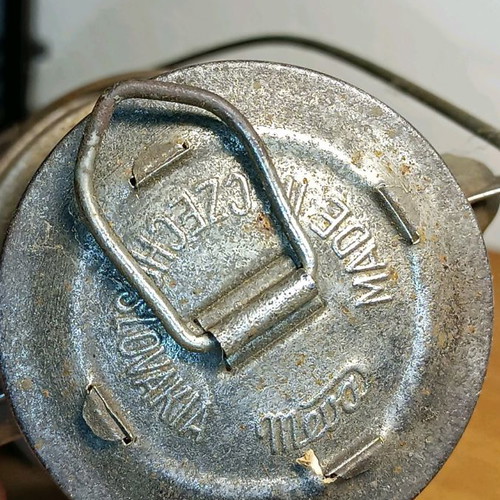 Vintage storm lantern used with cracked glass