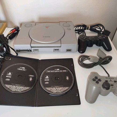 PlayStation 1 used with cables, two demos and two controllers