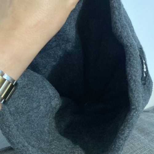 Gray knit cap like new with opening for ponytail