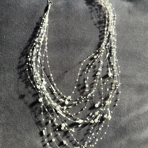 Accessorize white faux bijoux necklace used with white beads