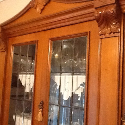 Handmade walnut display cabinet like new with crystal doors