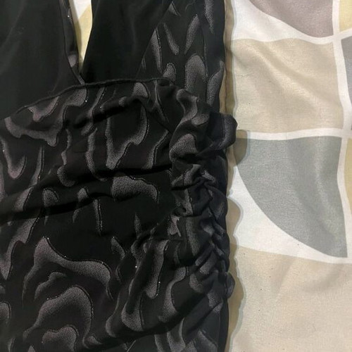 Blouse used, size S, black with silver details and glitter
