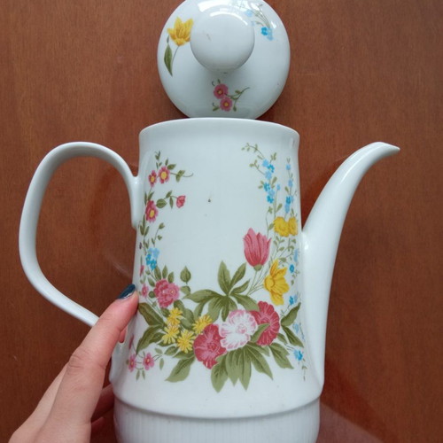 Vintage porcelain jug with floral design used, made in GDR