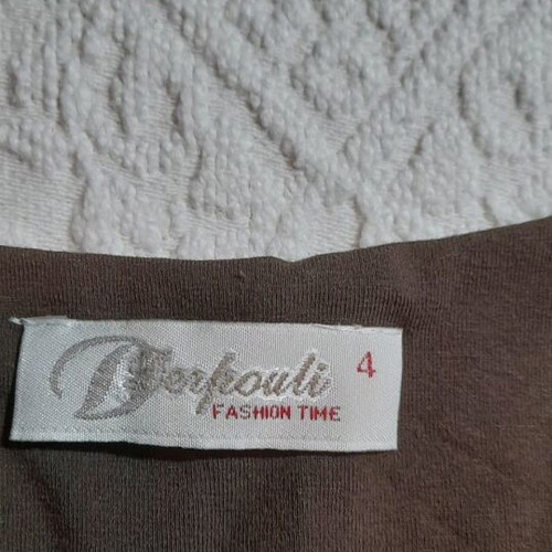 Brown sleeveless top with embroidered sequins like new