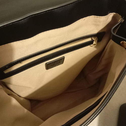 Kem backpack bag like new, black with gold details