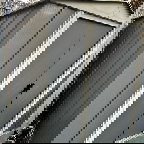 Metal storage shed ideal for outdoor space, spacious