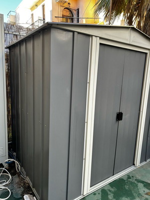 Metal storage shed ideal for outdoor space, spacious