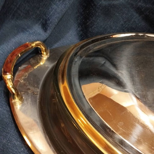 Heat-resistant serving dish used with base and lid