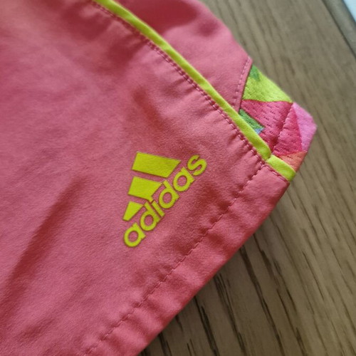 Adidas running shorts used, pink with patterned side panels and yellow accents, size S