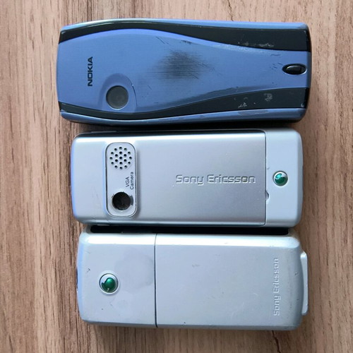 Lot of used Nokia and Sony Ericsson mobile phones from early 2000s
