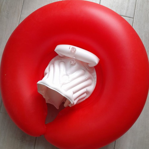 SwimTrainer Red flotation device like new, for 0-4 years