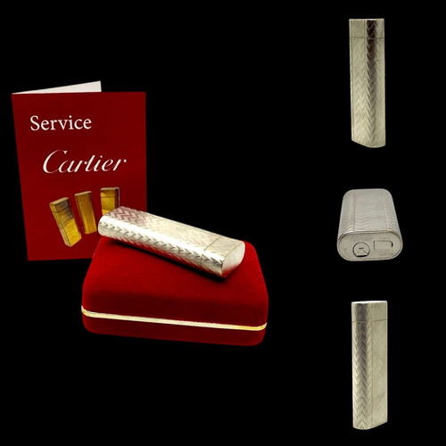 Cartier lighter used silver collectible with herringbone pattern