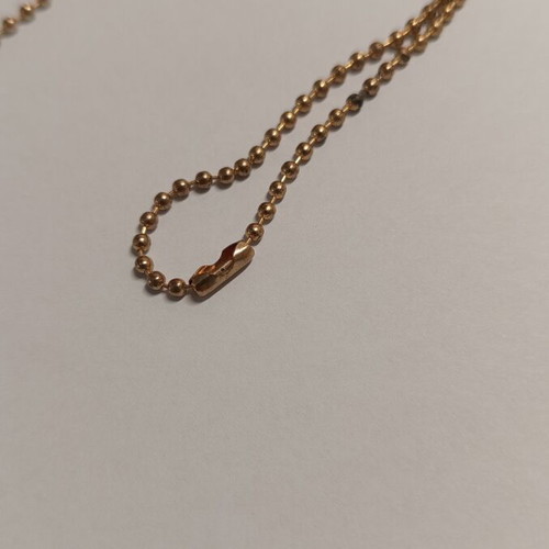 Long statement necklace like new, black and gold tassel pendant