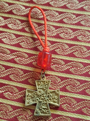 Collectible cross 2012 used with red bead decoration