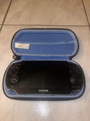 Sony PlayStation Vita σαν καινούργιο με 2 παιχνίδια και θήκη One Piece