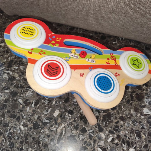 Wooden drum toy with music used
